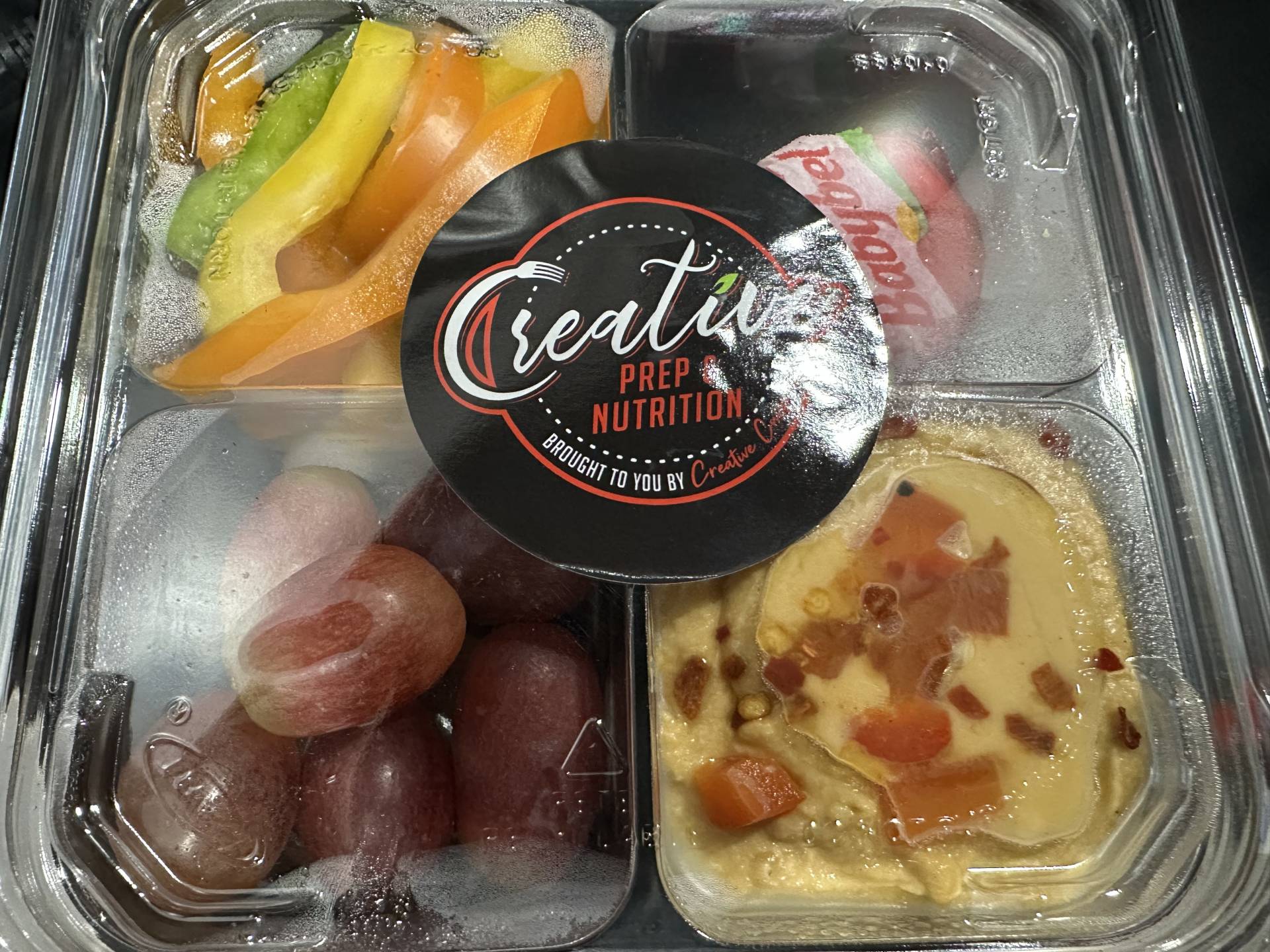 Protein Snack Pack (Hummus, Bell Peppers, Grapes, Babybel Cheese)